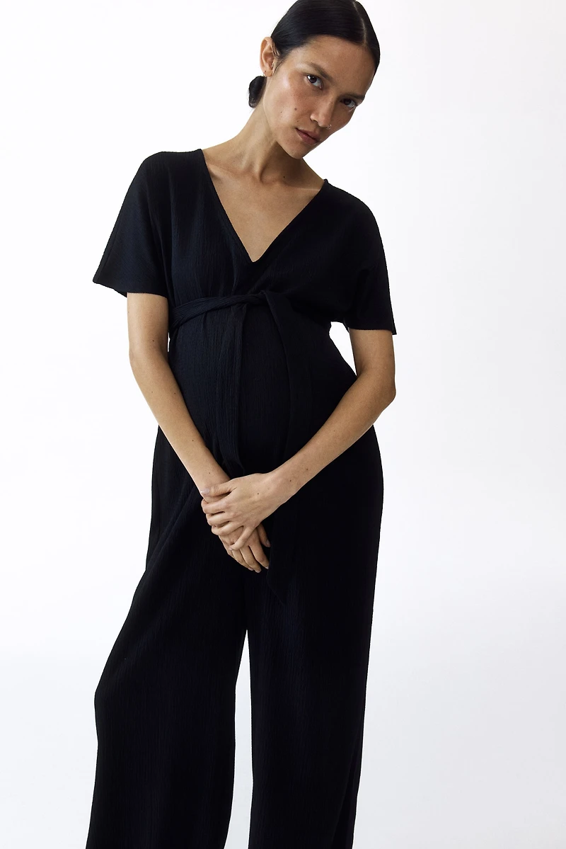 MAMA Short-sleeved tie-belt jumpsuit