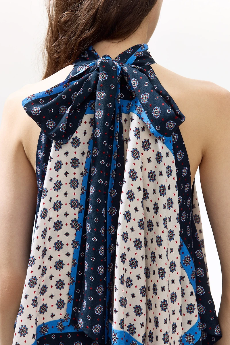 Haut dos nu en satin