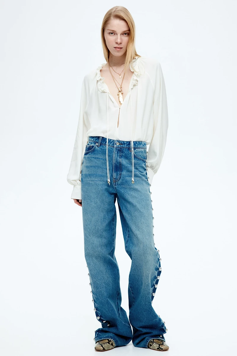 Blouse volantée avec cordon de serrage