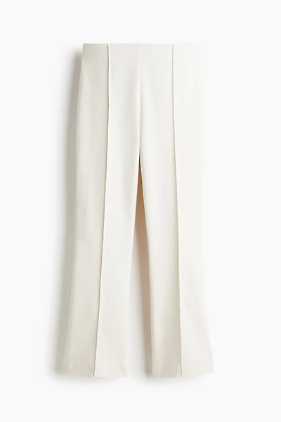 Pantalon évasé avec plis devant