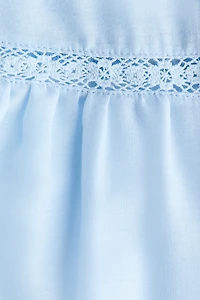 Blouse à volants avec manches ballon