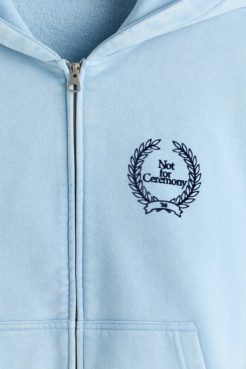 Veste carré ample à capuche et fermeture éclair