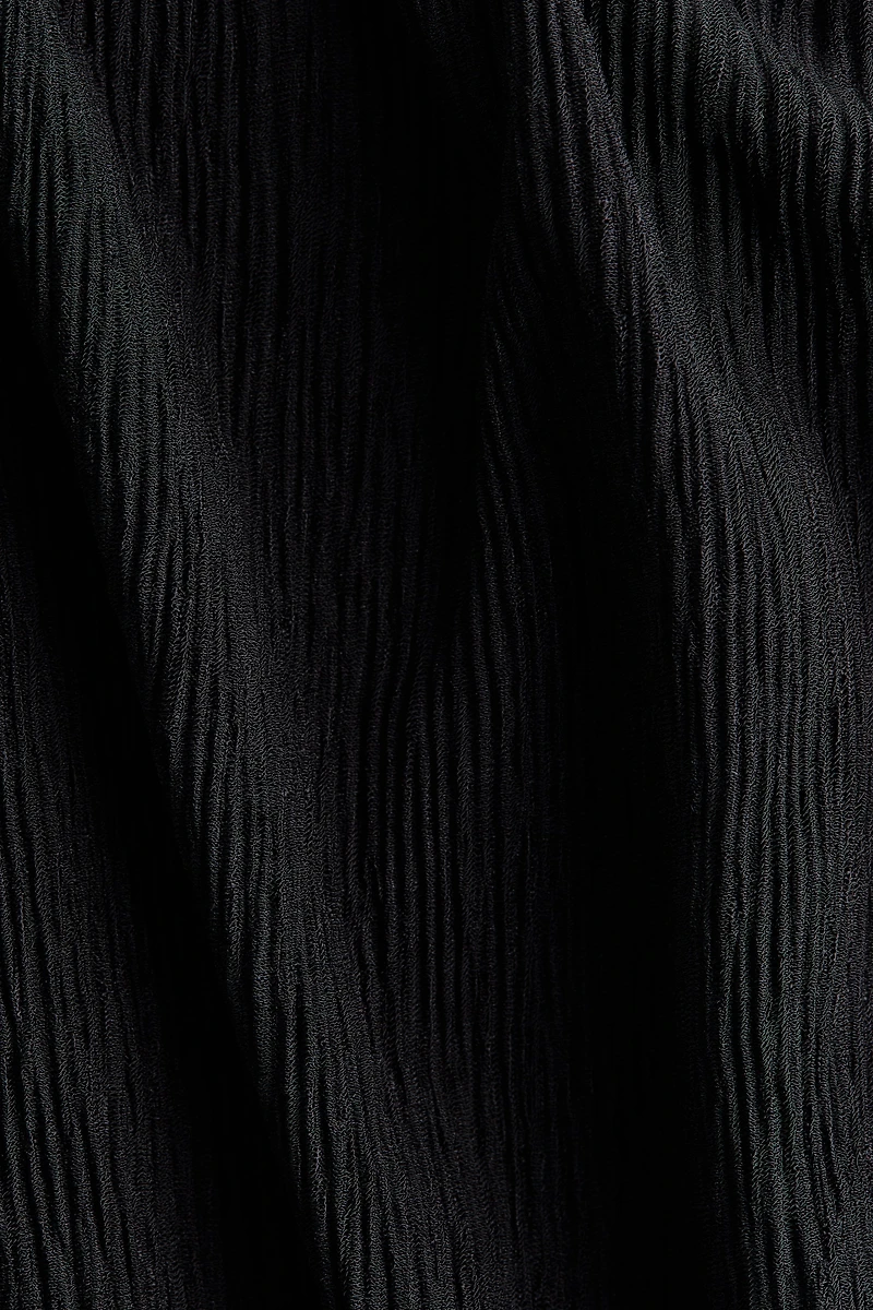 Haut avec détail style écharpe