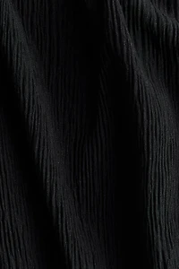 Haut avec détail style écharpe