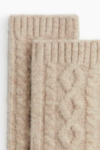 Jambières en tricot torsadé