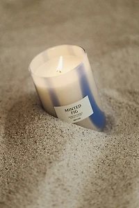 Bougie parfumée dans un pot en verre