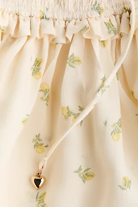 Ruffle-Trimmed Smocked-Bodice Dress
