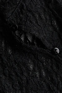 Haut en dentelle avec mancherons