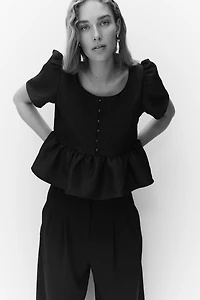 Blouse péplum en brocart