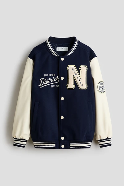 Veste de baseball avec appliqués