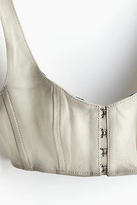 Haut bustier court en cuir