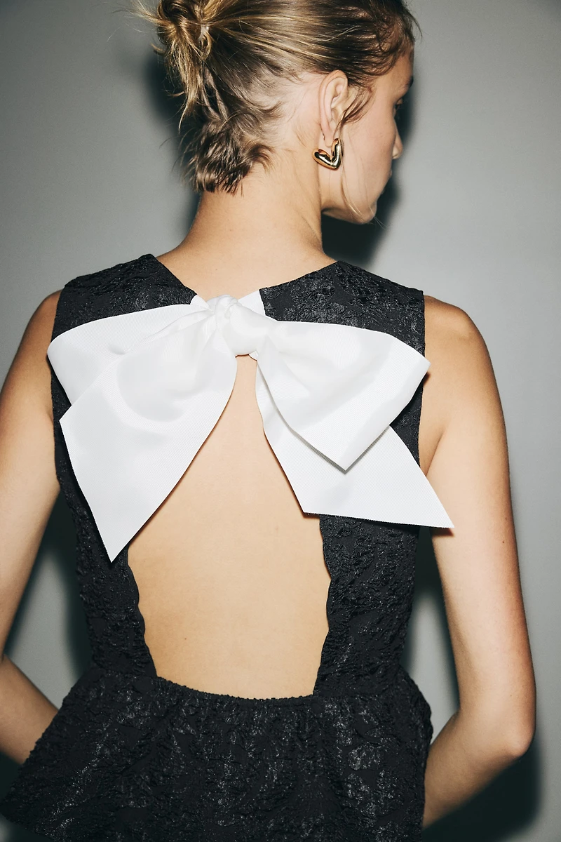 Haut péplum avec boucle