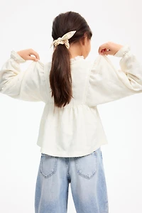 Blouse en jersey texturé