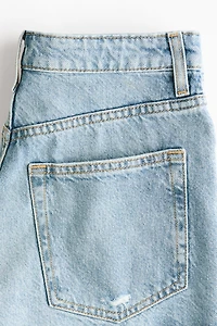 Short en denim à effet usé