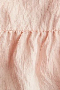 Bow-Detail Peplum Top