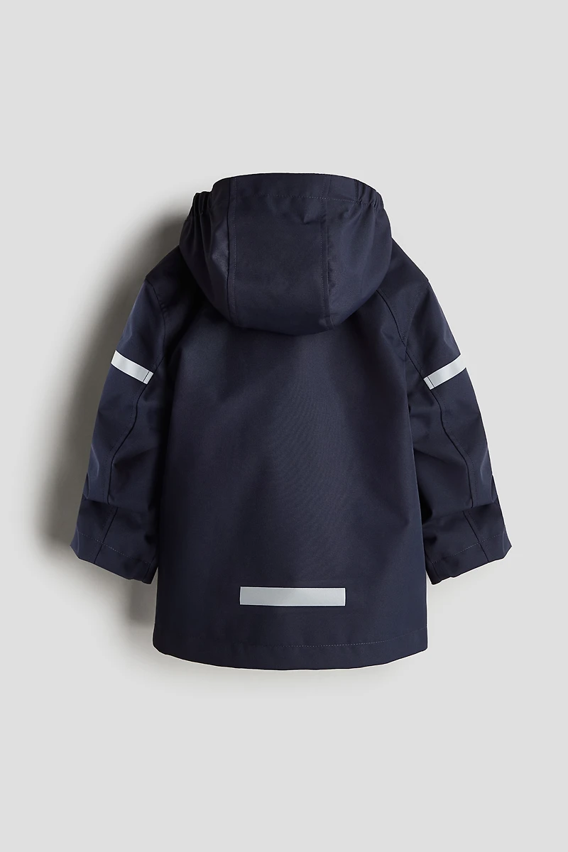 Parka s'ajustant à la croissance résistant l'eau