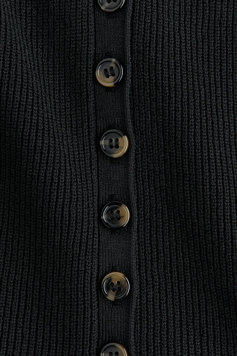 Rib-Knit Peplum Sleeveless Top