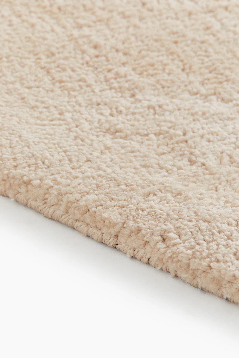 Grand tapis asymétrique