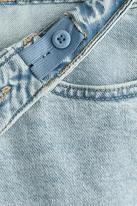 Short taille basse en denim aux jambes larges