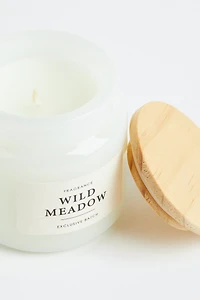 Bougie parfumée dans un pot en verre
