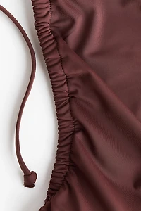 Maillot de bain coussiné jambe échancrée