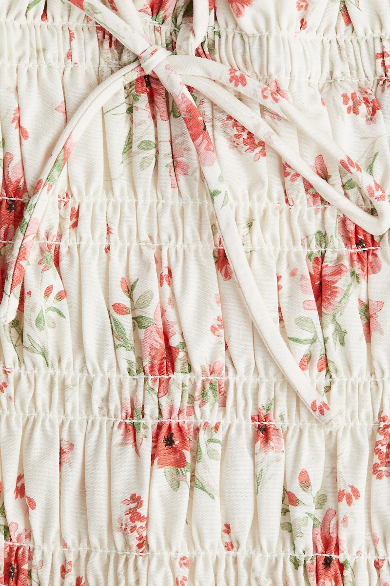 Robe en coton à corsage nid d'abeille