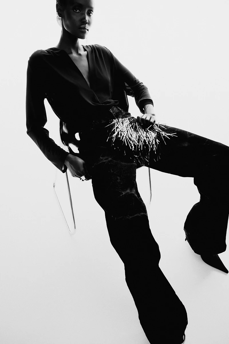 Maillot string drapé à encolure en V