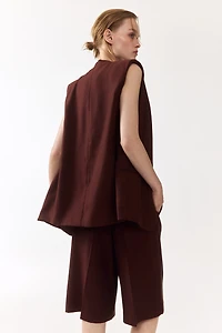 Veste sans manches avec ceinture