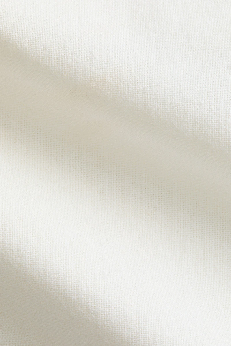 Housse de coussin en lin mélangé avec détail brodé