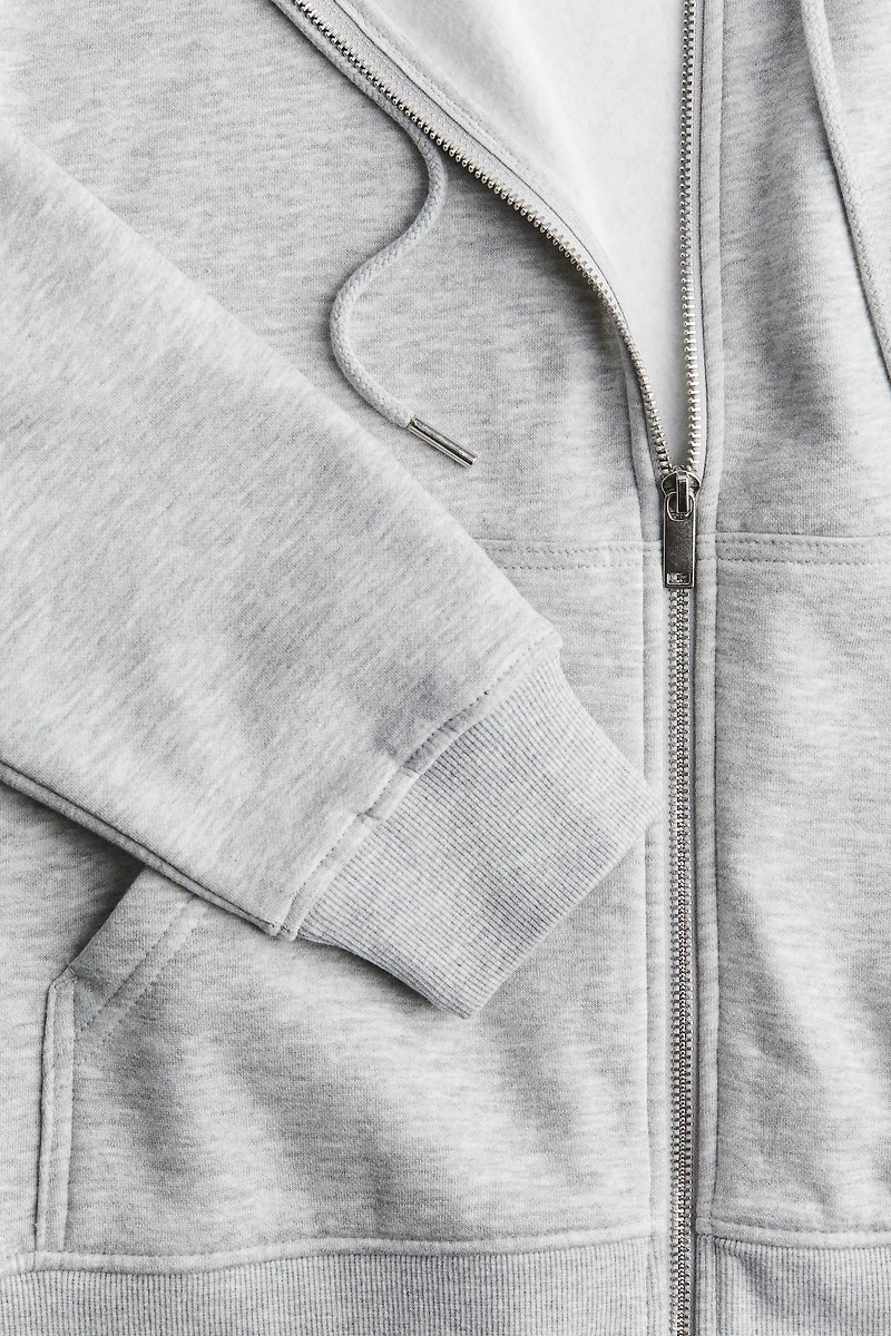 Veste à capuchon glissière