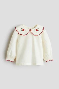 Blouse en coton avec détails brodés