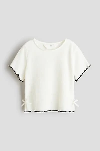 Haut avec boucle