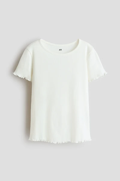 T-shirt côtelé à bords surjetés