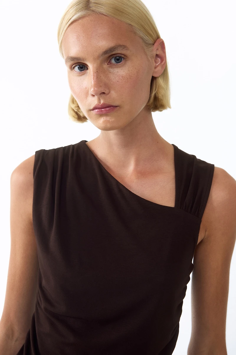 Draped Asymmetric Top