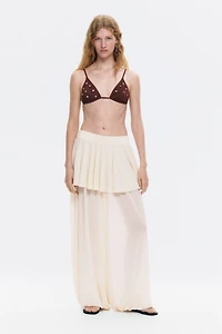 Pantalon en filet avec jupe superposée