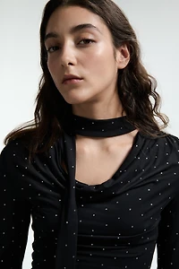 Haut avec détail façon écharpe