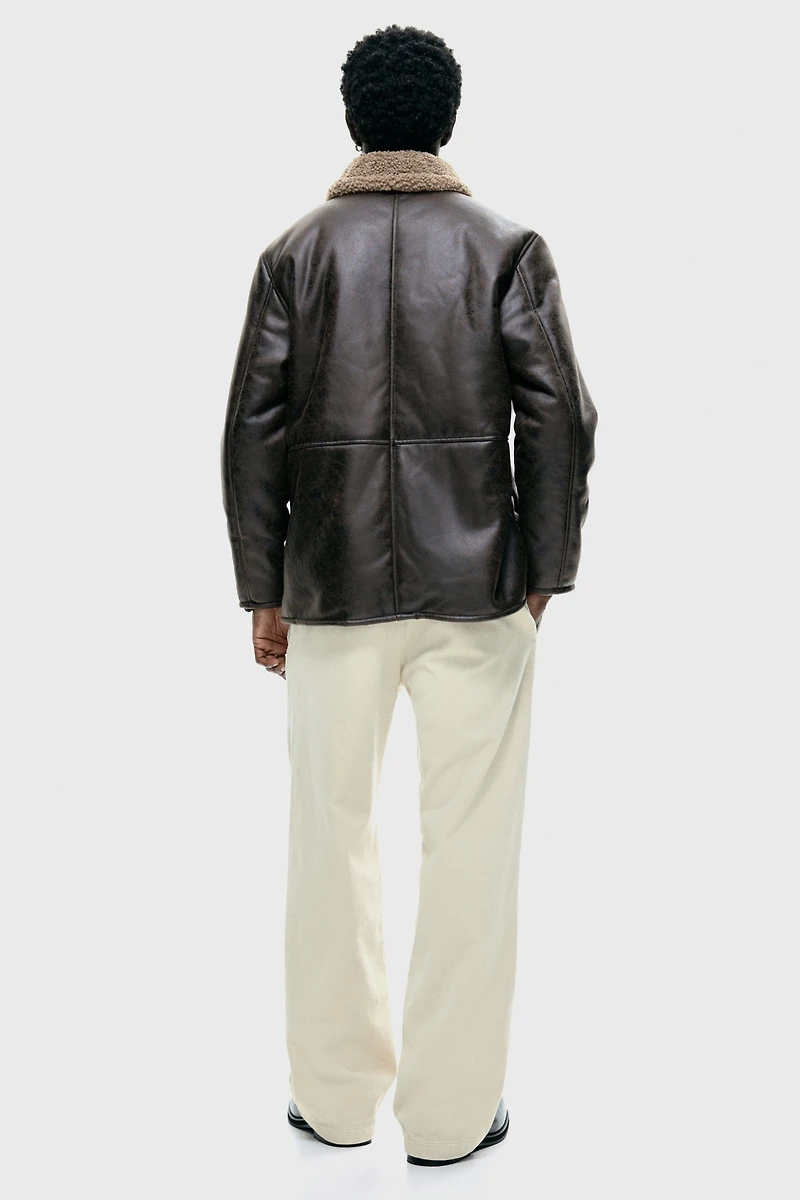 Veste en tissu enduit