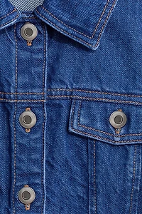 Chandail péplum sans manches en denim