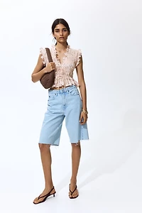 Blouse sans manches en nid d'abeille
