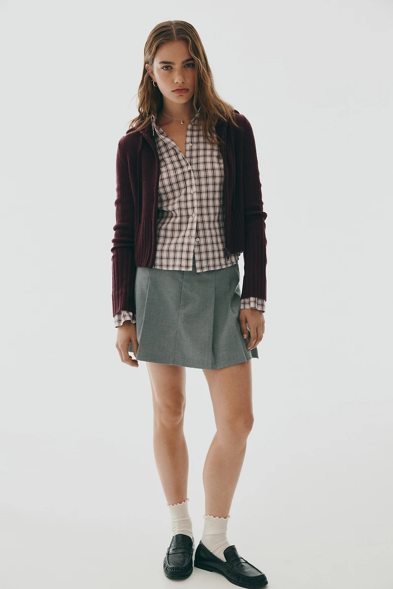 Gilet à capuche et fermeture éclair