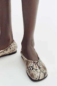 Ballerines avec imprimé peau de serpent