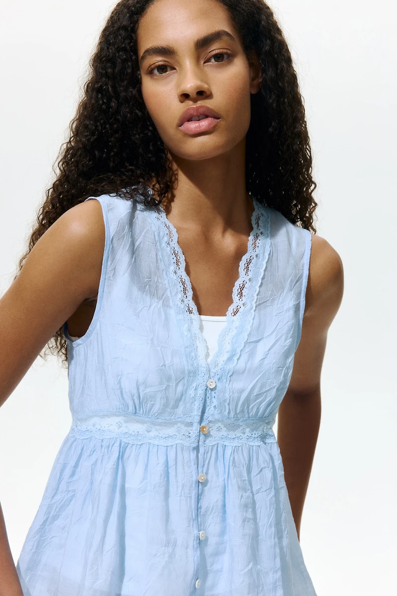 Lace-Trimmed Peplum Top
