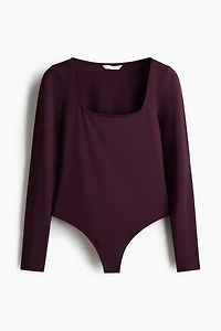 Maillot tanga à manches longues