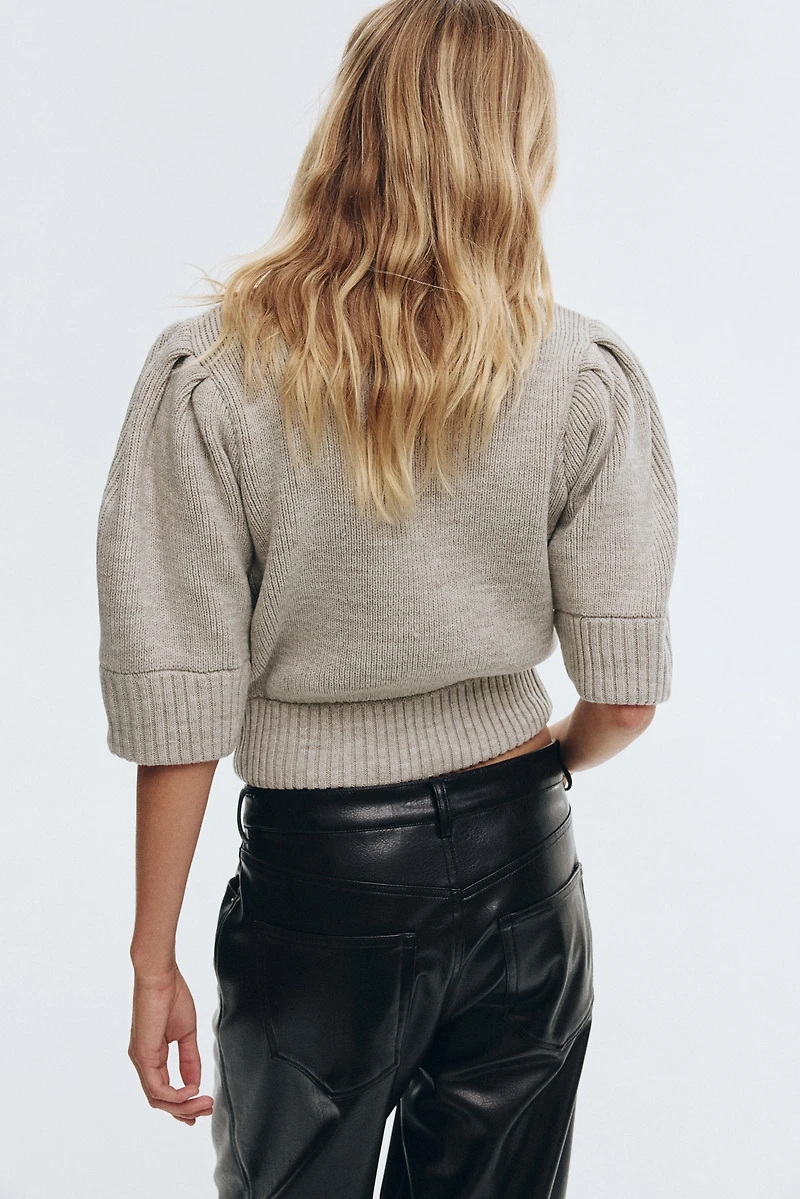 Haut en maille côtelée