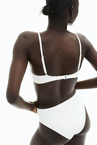 Haut de maillot pigeonnant