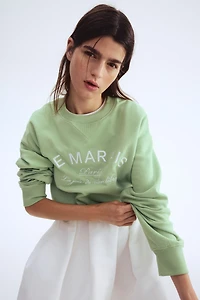 Sweatshirt with Text Motif