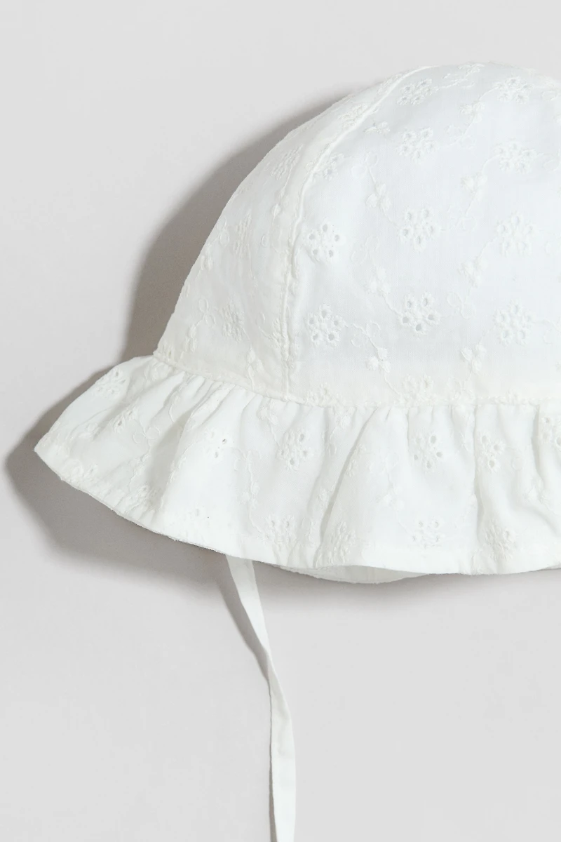 Chapeau de soleil en coton avec broderie anglaise