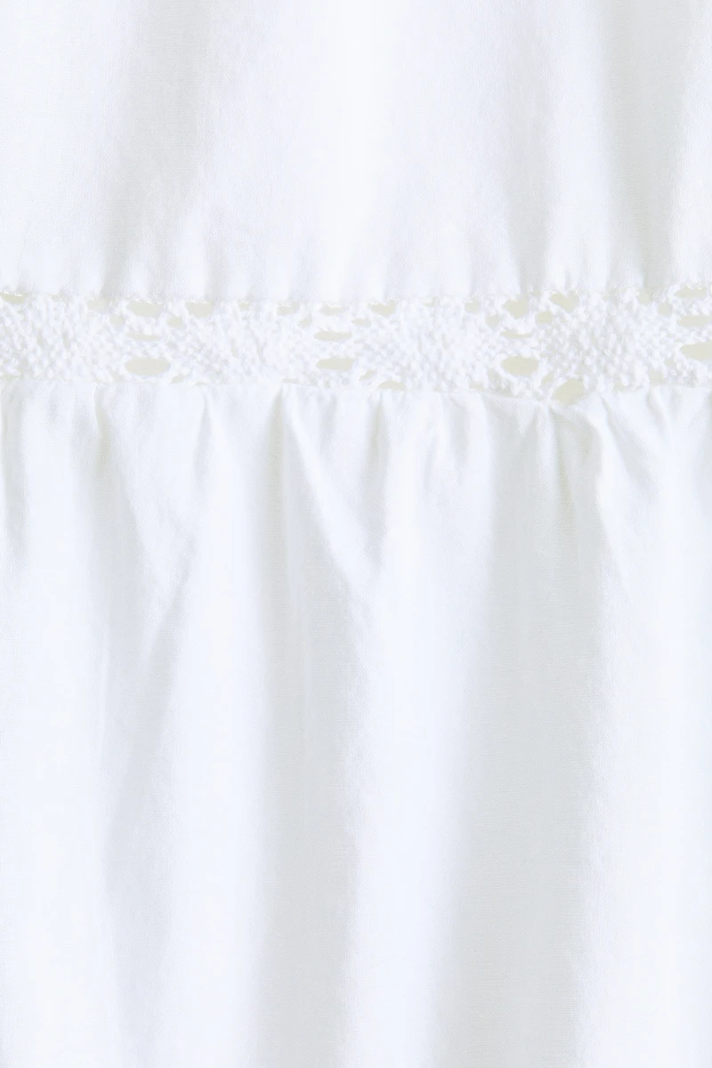 Lace-Trimmed Dress with Flared Skirt