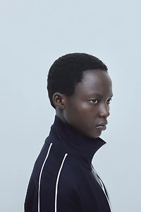 Veste de survêtement avec passepoils