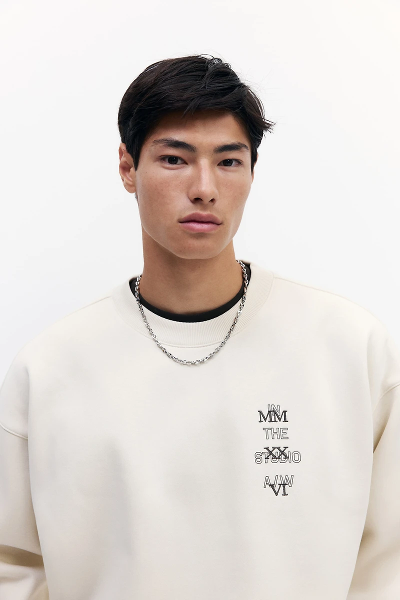 Chandail ample en molleton imprimé